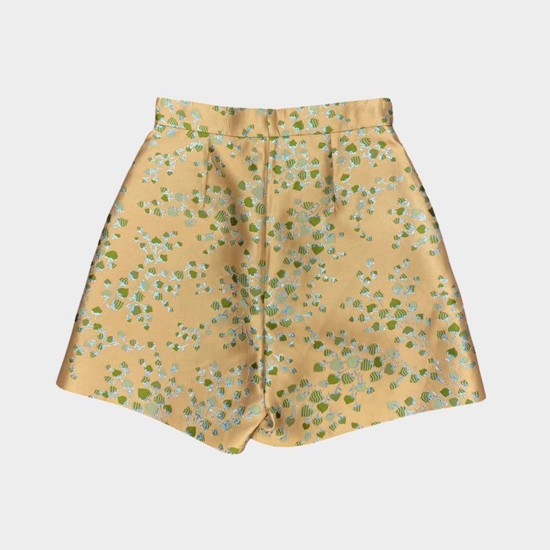 Gucci women's beige metallic leaf motif shorts