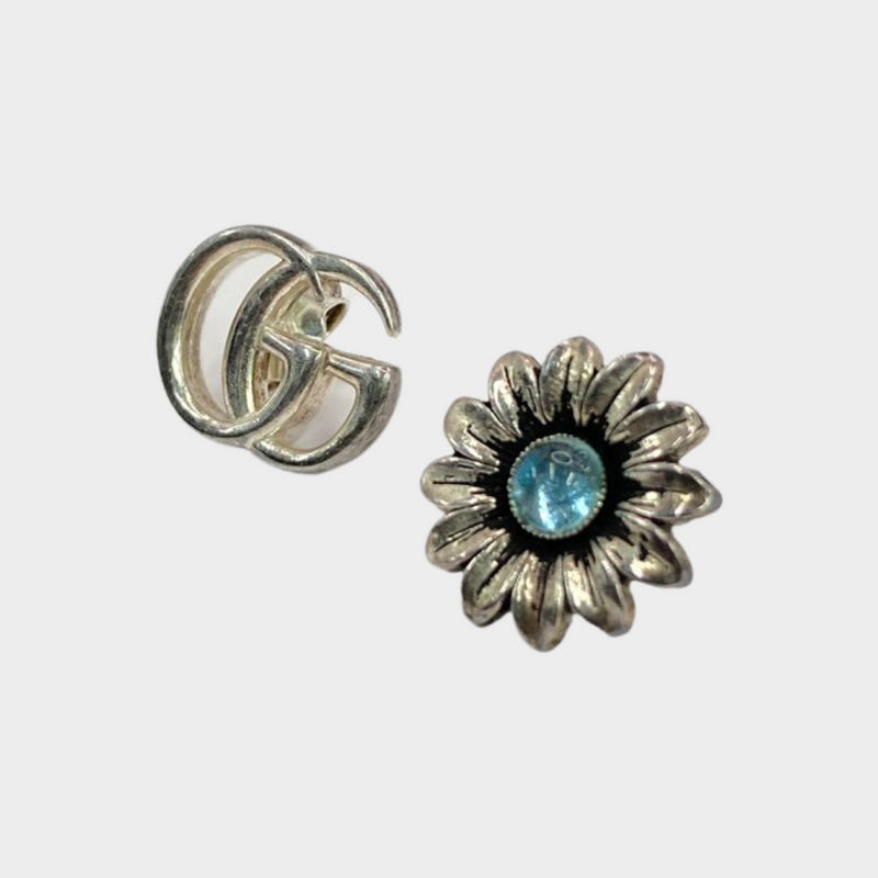 Gucci women's silver flower and GG logo earrings