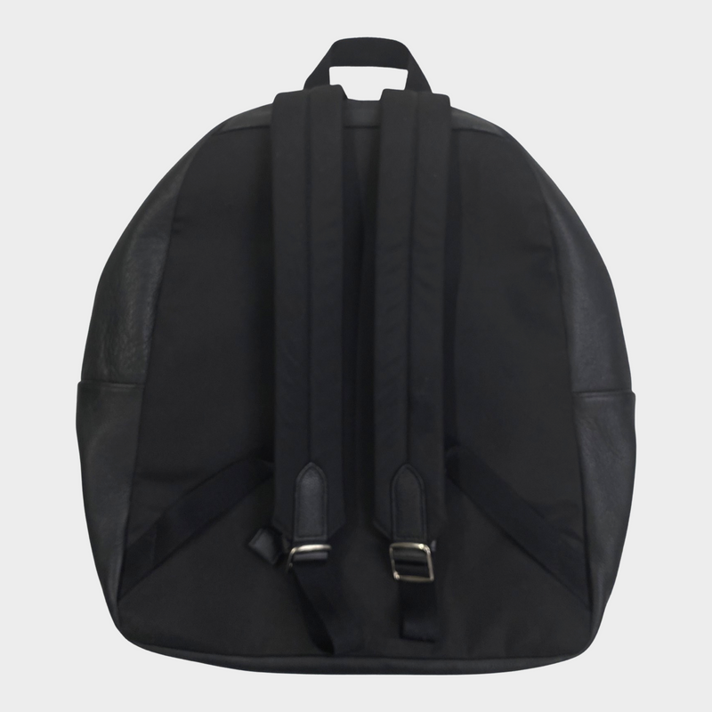 Coach men's black leather and cream fur backpack