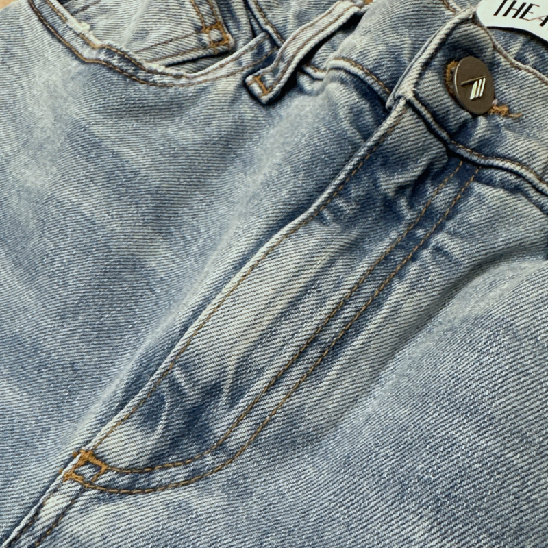 The Attico women's blue denim slim-fit jeans with cutout hem