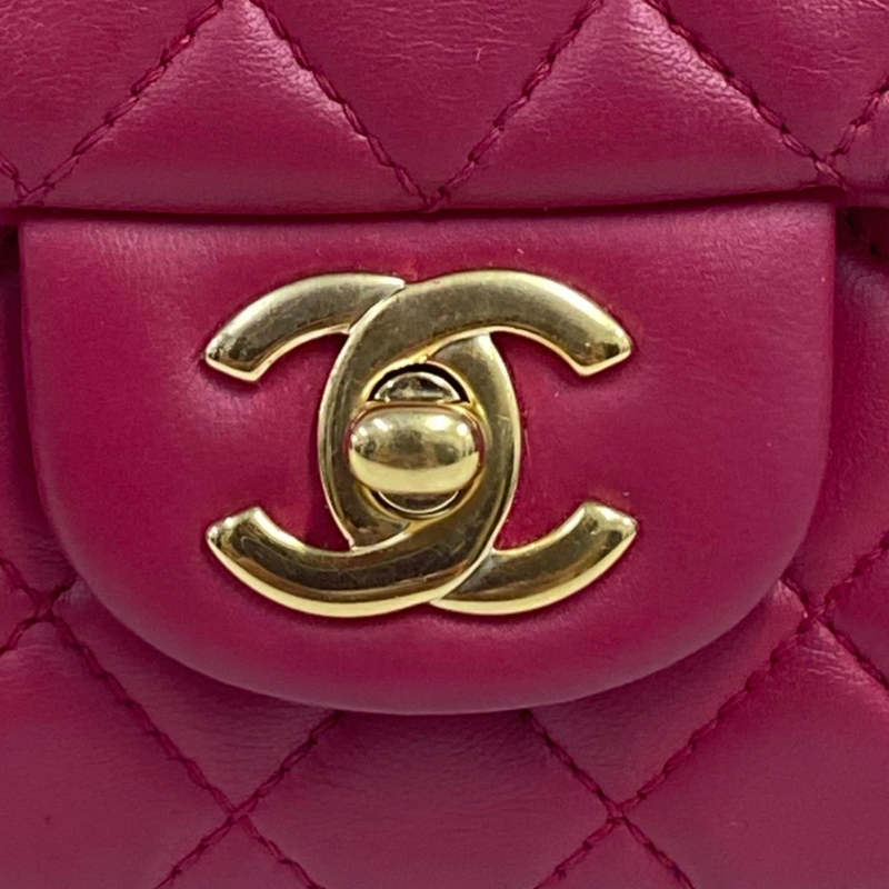 Chanel women's raspberry leather quilted flap bag with metal heart charms