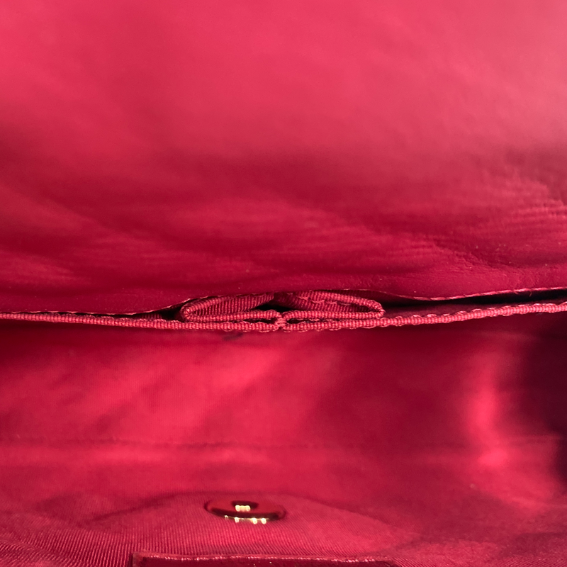 Chanel women's raspberry leather quilted flap bag with metal heart charms