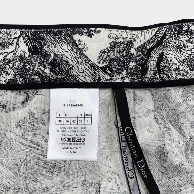 CHRISTIAN DIOR women's black and white jungle print trousers