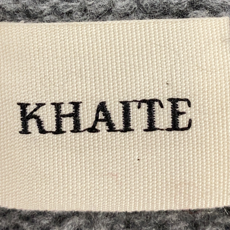 Khaite women's grey v-neck jumper with logo