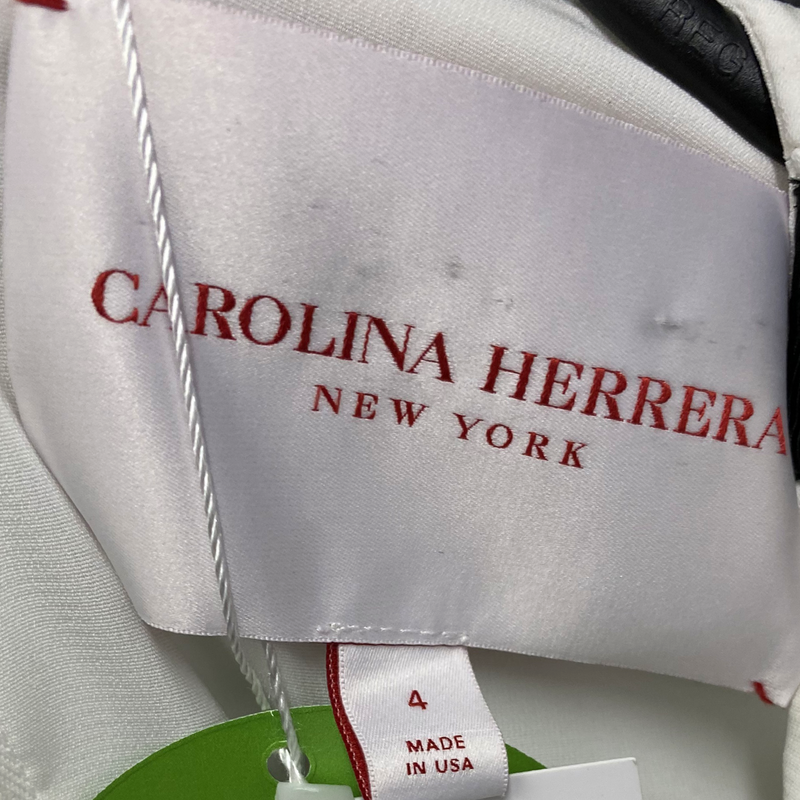 Carolina Herrera white and black accented long-sleeved dress with gold buttons