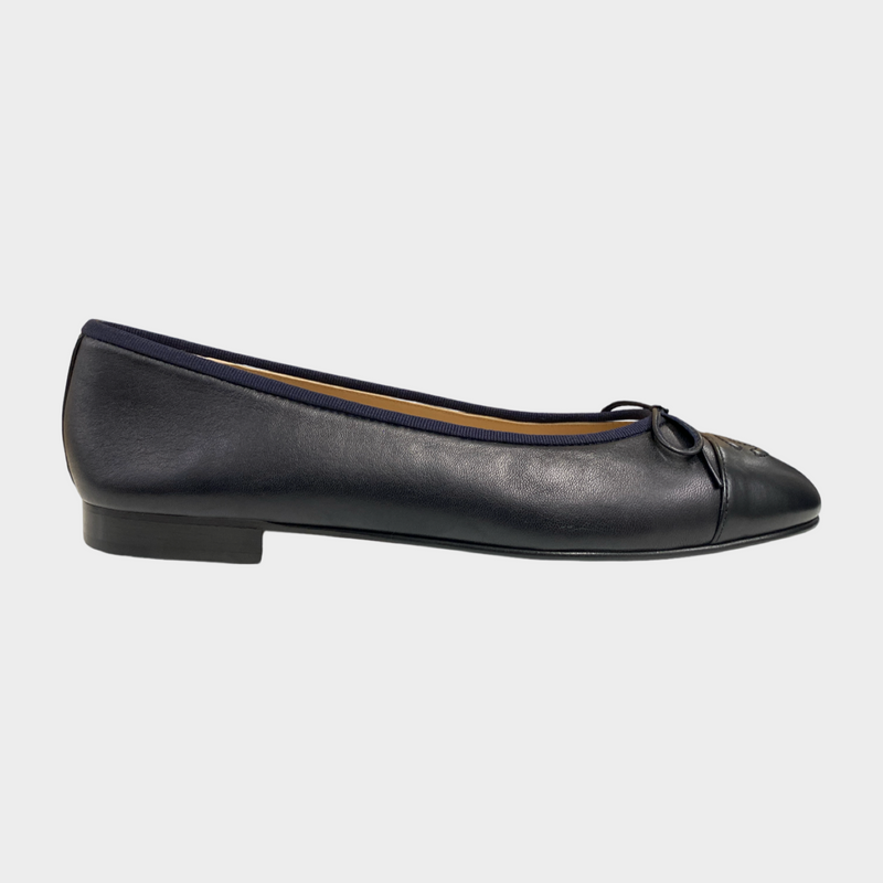 Chanel women's black leather flats with navy borders