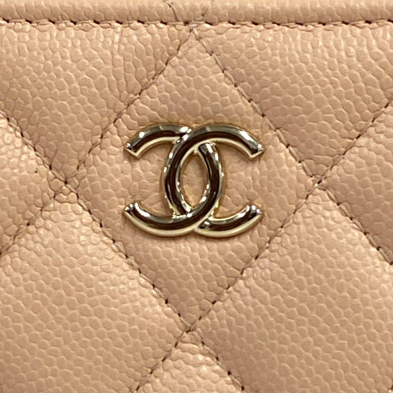 Chanel women's peach caviar leather pouch