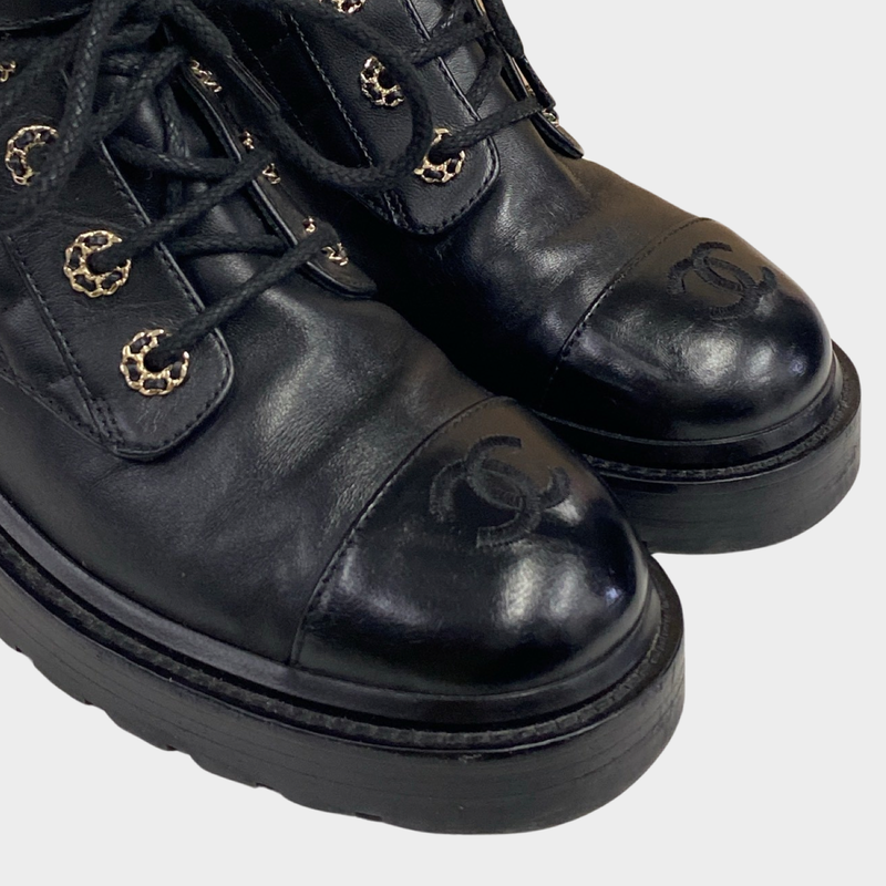 Chanel women's black CC quilted boots with flap