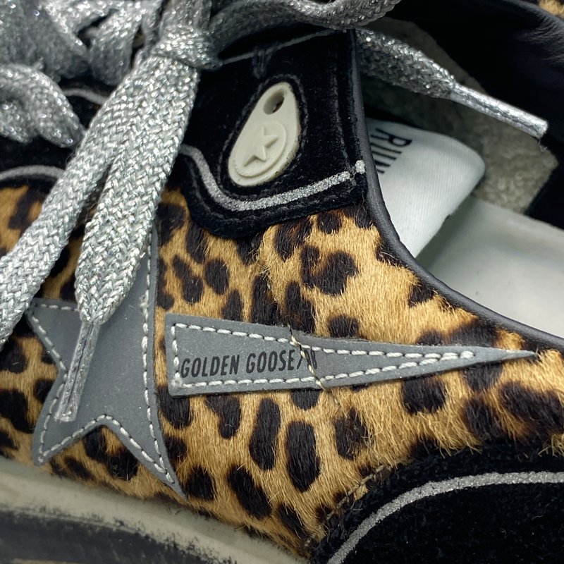 Golden Goose women's Running Sole sneakers in black with leopard-print pony skin accents and silver leather star