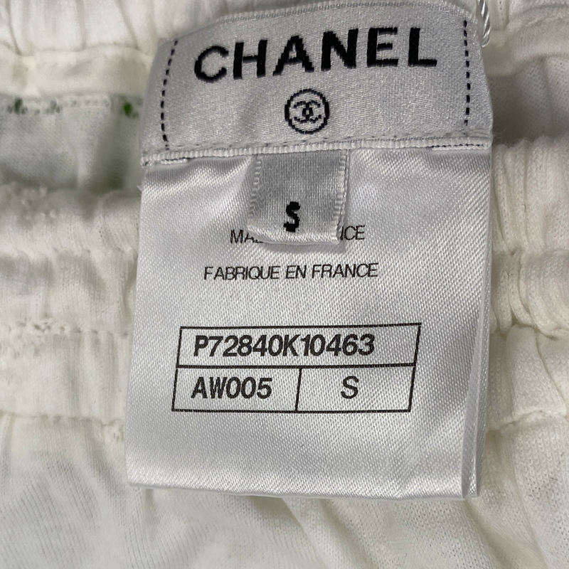 Chanel women's white cotton CC logo shorts with pearls buttons
