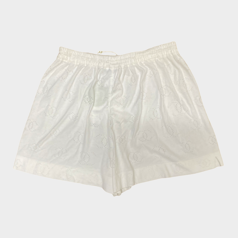 Chanel women's white cotton CC logo shorts with pearls buttons