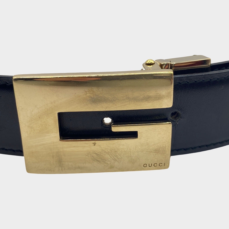 Gucci women's vintage black leather belt with gold G buckle