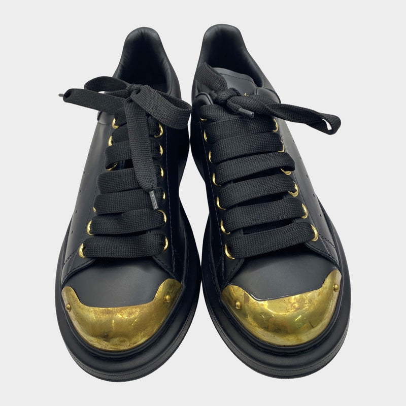 Alexander Mcqueen women's black leather raised-sole trainers with gold accents