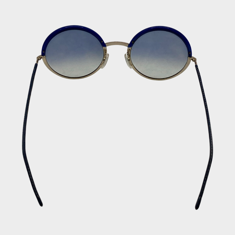 Cutler & Gross women's blue and gold round sunglasses
