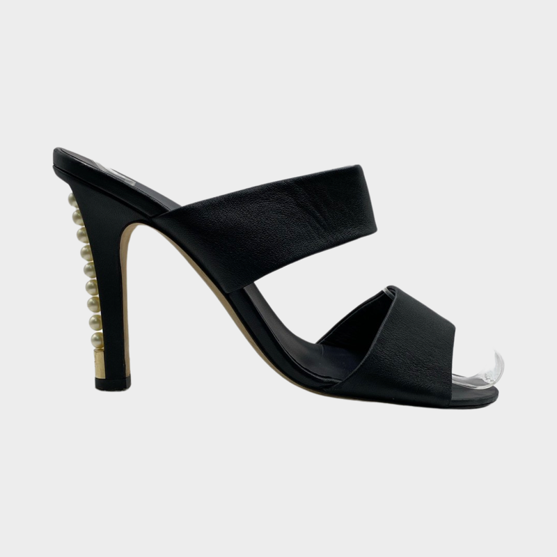 Chanel black leather mules with pearl detail