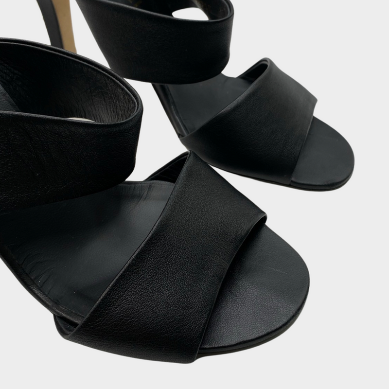 Chanel black leather mules with pearl detail