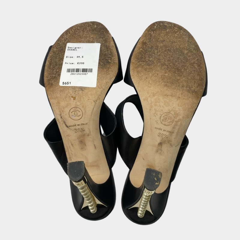 Chanel black leather mules with pearl detail