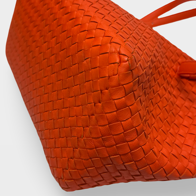 Bottega Veneta women's orange intrecciato woven leather tote bag