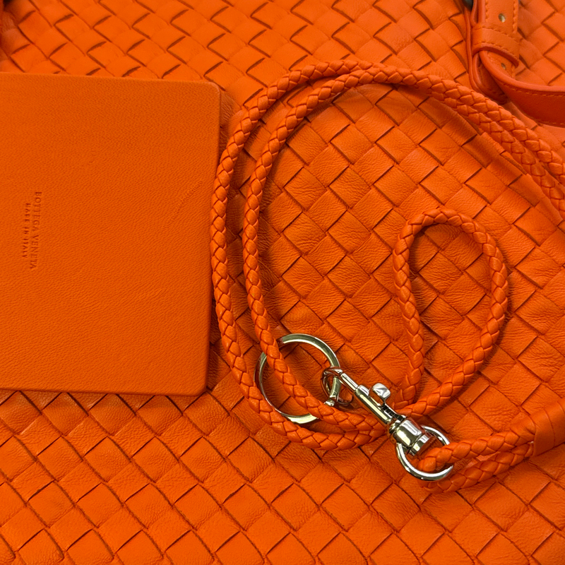 Bottega Veneta women's orange intrecciato woven leather tote bag