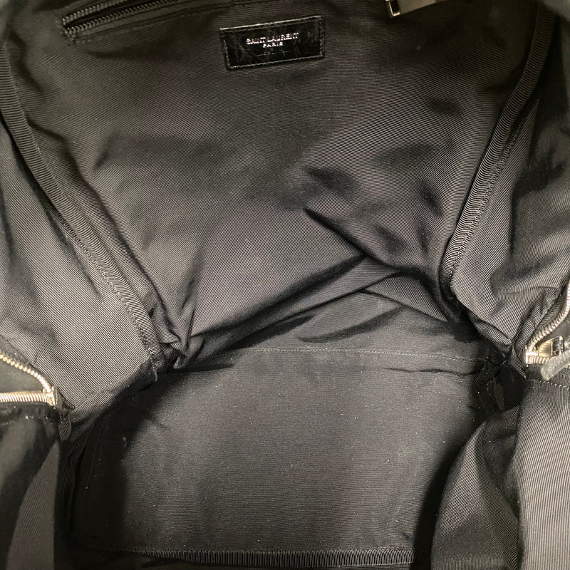 Saint Laurent men's leather City backpack with triple zipper detailing