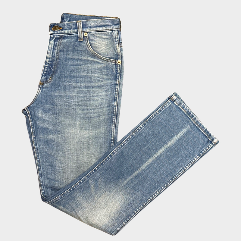 GUCCI women's blue distressed jeans with logo detail at the back