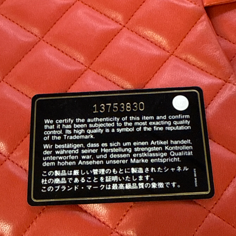 Chanel Women's coral red leather flap bag