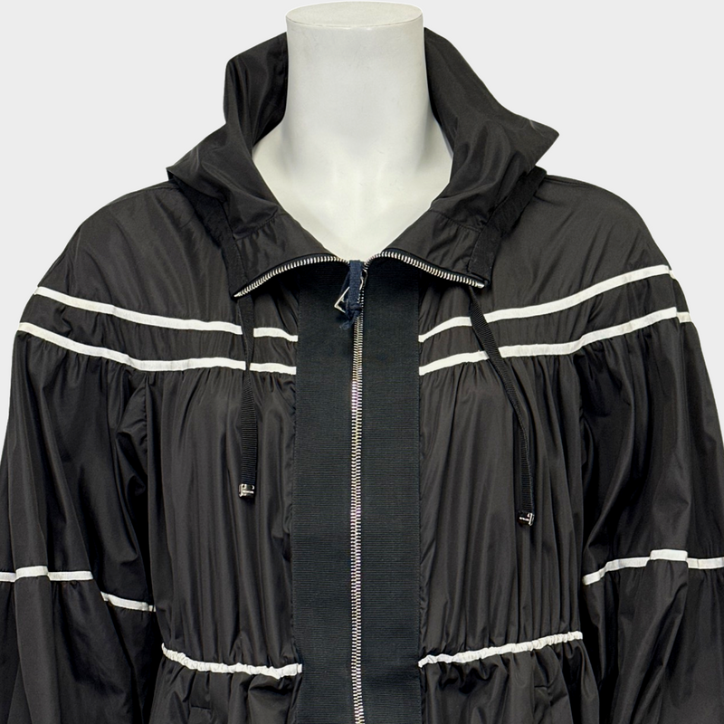 MONCLER women's black and white polyamide oversized rain coat with ruffles and a hoodie