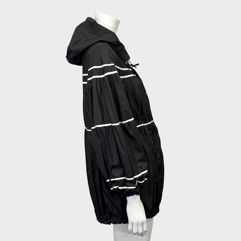 MONCLER women's black and white polyamide oversized rain coat with ruffles and a hoodie