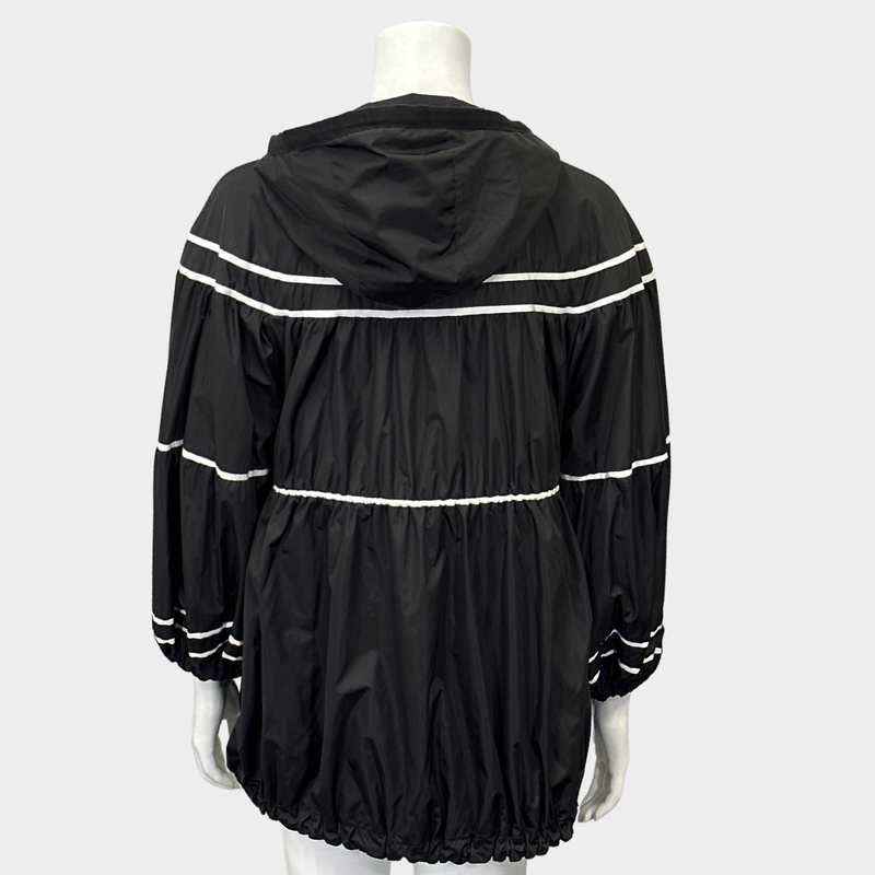 MONCLER women's black and white polyamide oversized rain coat with ruffles and a hoodie
