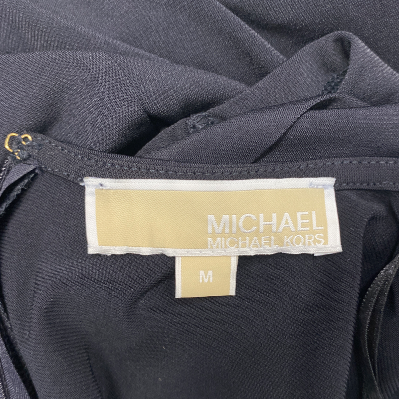 Michael Kors women's black jumpsuit with tan leather belt