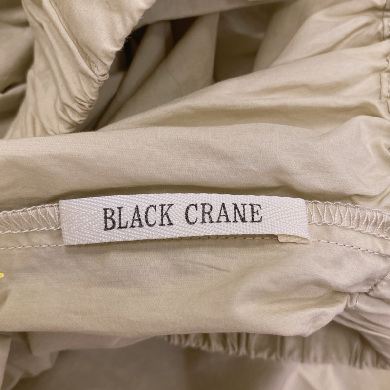 Black Crane ecru cotton maxi skirt with elasticated waist
