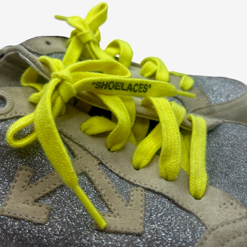 Off-White men's silver glitter sneakers with neon yellow laces