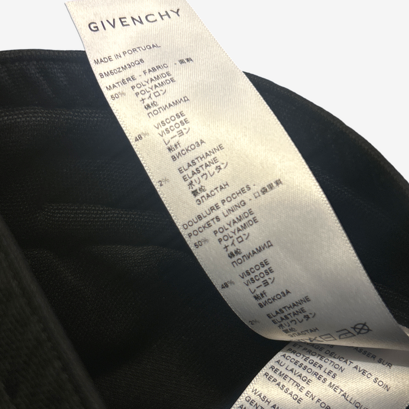 Givenchy men's black tracksuit pants with white graffiti monogram print