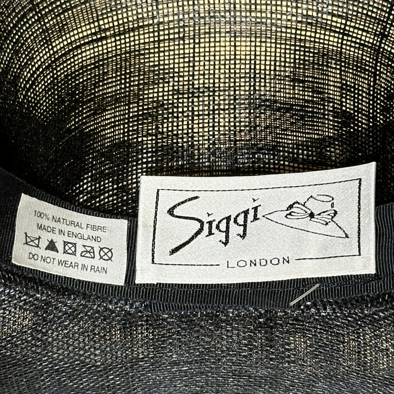 Siggi London black structured mesh hat with white feather flower detail