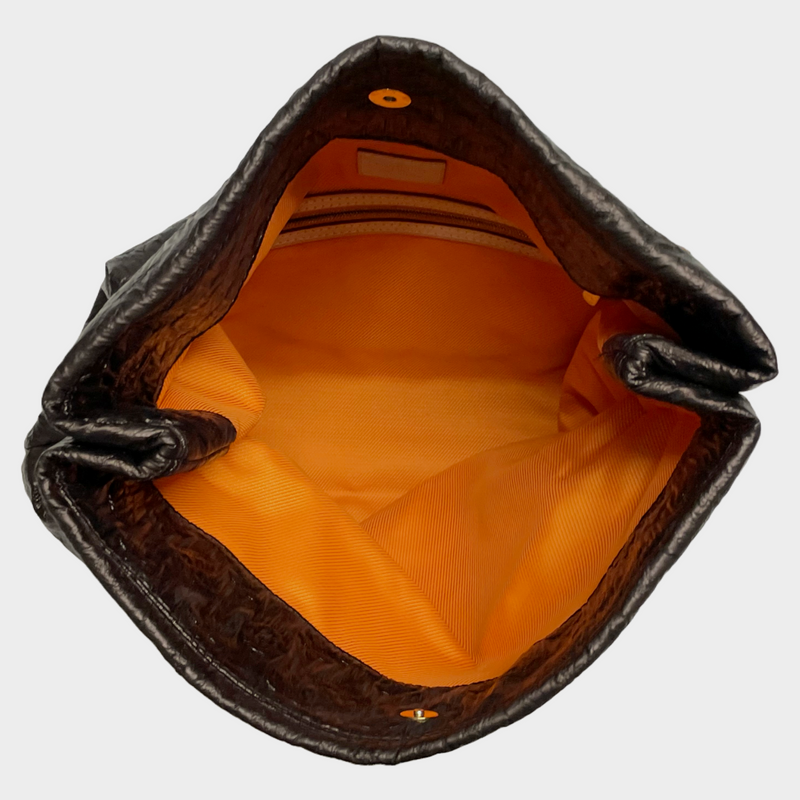 Louis Vuitton women's brown embossed monogram textured leather clutch