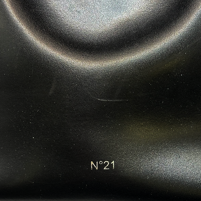 Nº21 black structured bucket bag with side pompons