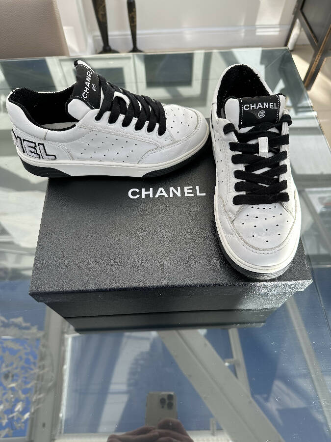 Chanel women’s black and white leather low top trainers