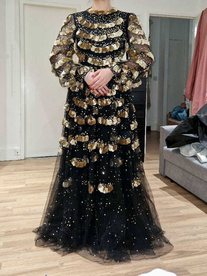 Valentino black tulle long-sleeved gown with handmade gold sequin-embellished details
