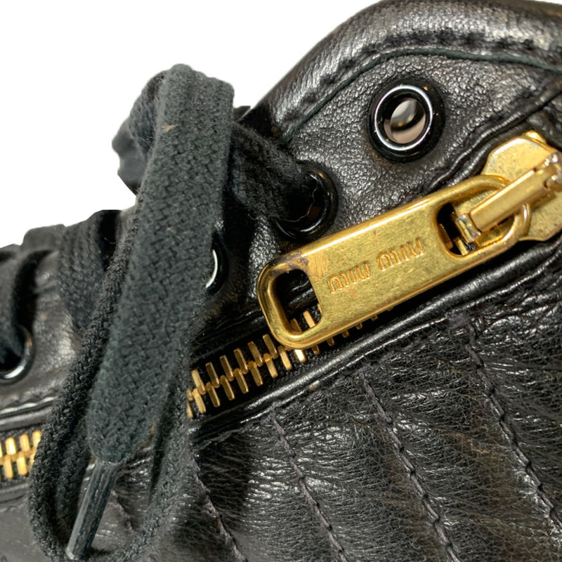MIU MIU black leather sneakers
