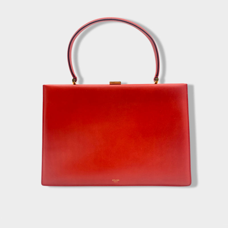 pre-owned CÉLINE orange-red leather handbag with gold hardware