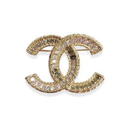 pre-owned CHANEL CC gold brooch with rhinestones