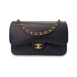 pre-owned CHANEL black and gold grained leather flap bag