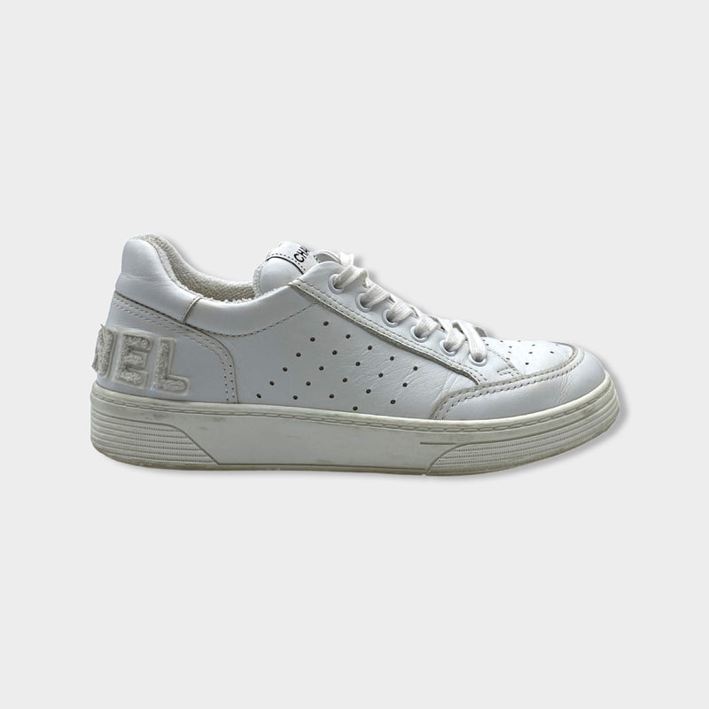 pre-owned CHANEL white leather sneakers