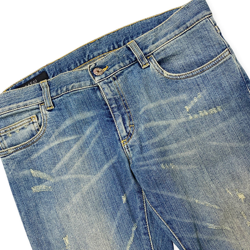 pre-loved GUCCI blue distressed jeans