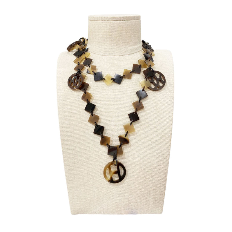 pre-owned HERMÈS brown and beige horn necklace