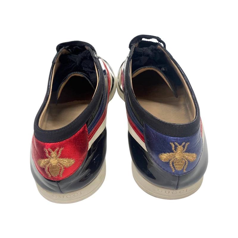 GUCCI Falacer patent leather trainers