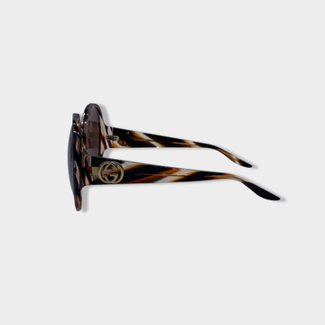 Gucci hand sunglasses shop
