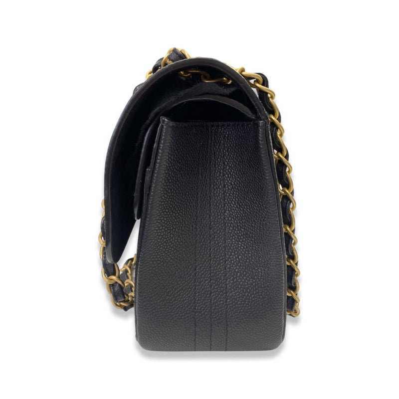 CHANEL black and gold grained leather flap bag