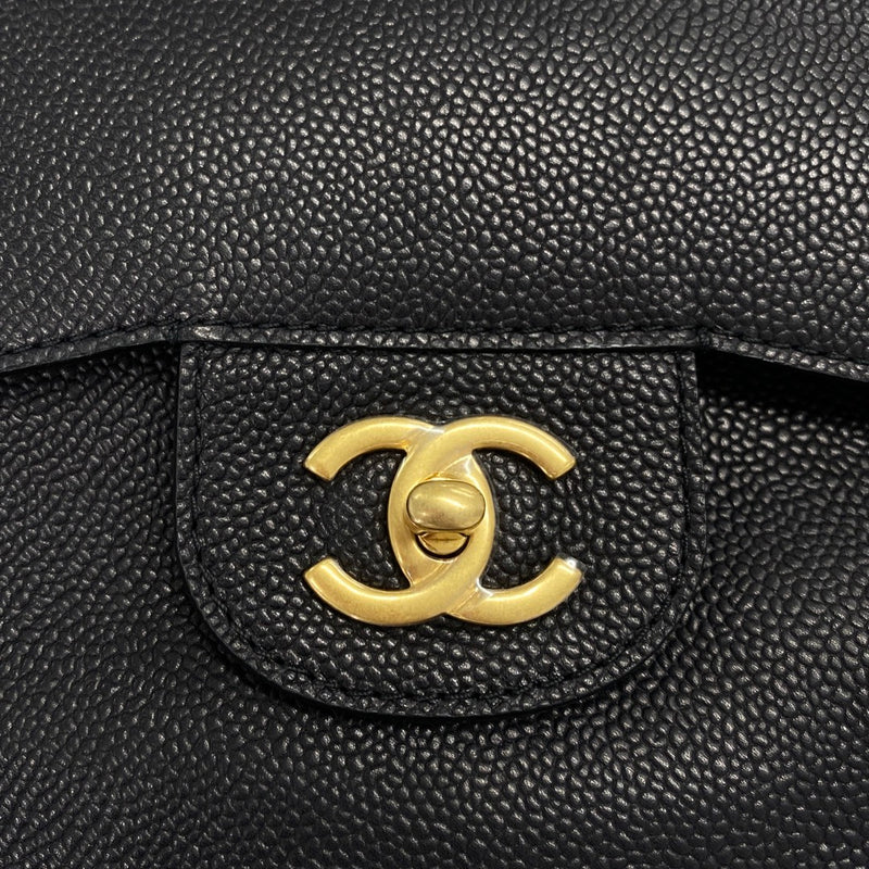 CHANEL black and gold grained leather flap bag