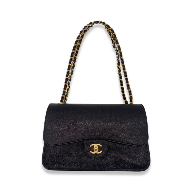 second-hand CHANEL black and gold grained leather flap bag